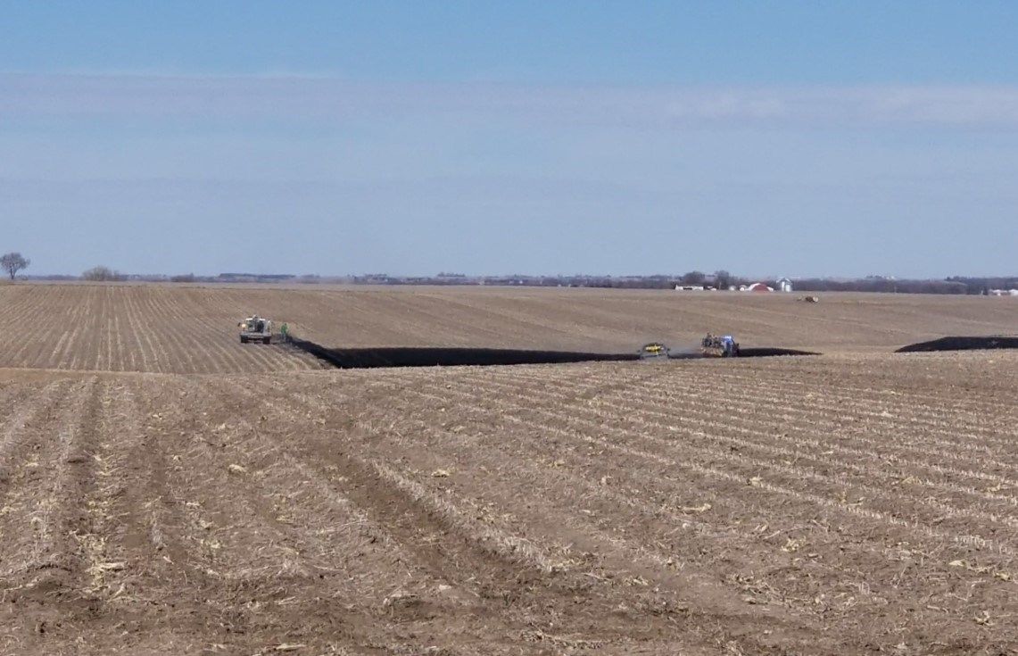 Firefighters use grass rigs to douse flames