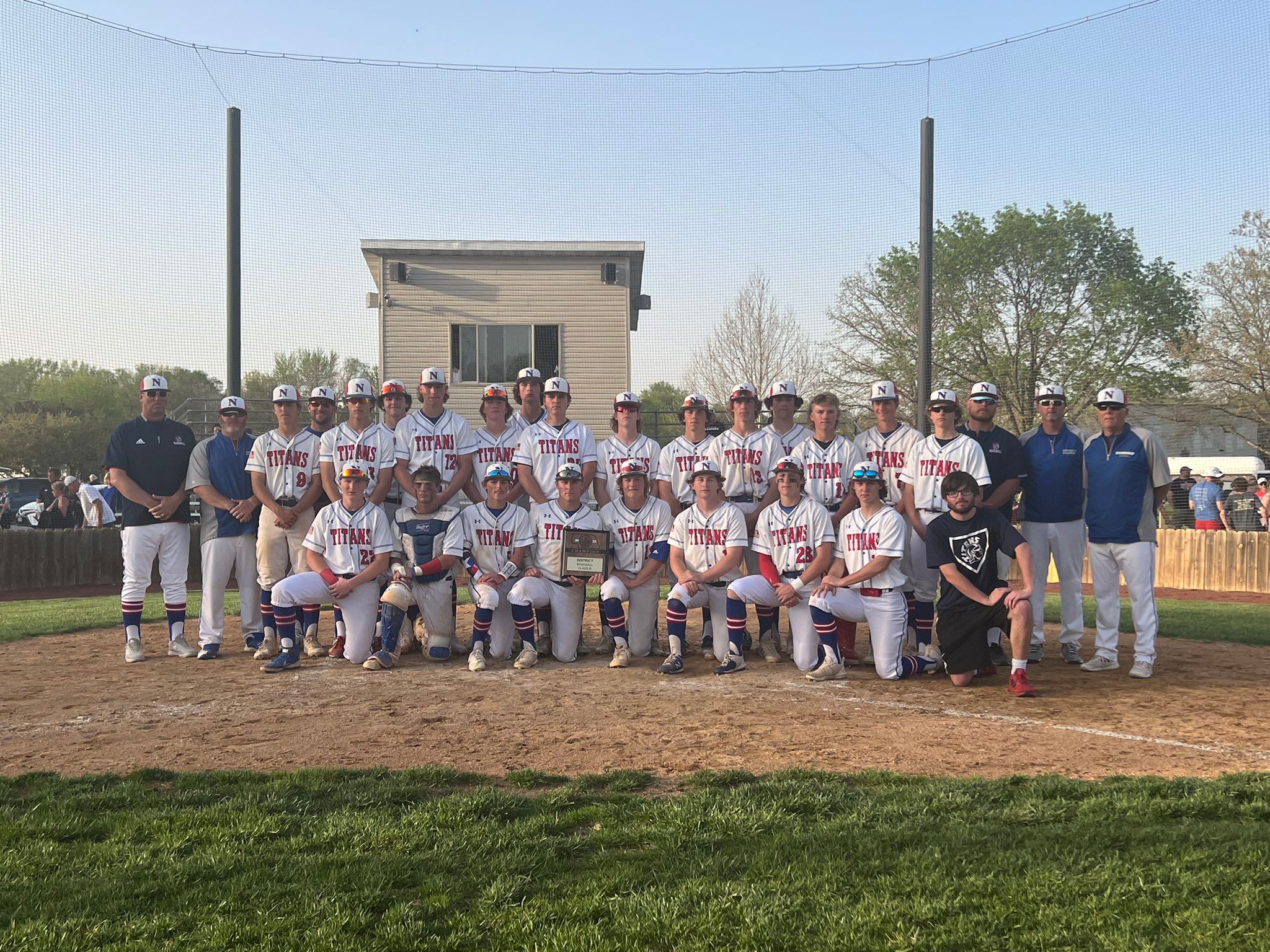 The Norris Titan baseball team poses after winning the B-1 District Championship 5-2 over Adams Central Monday.