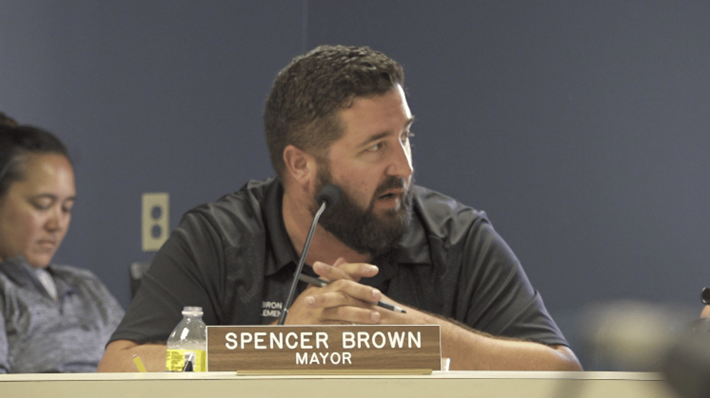 Fairbury Mayor Spencer Brown discusses his choice for the town's new city administrator during a city council meeting on July 5th.
