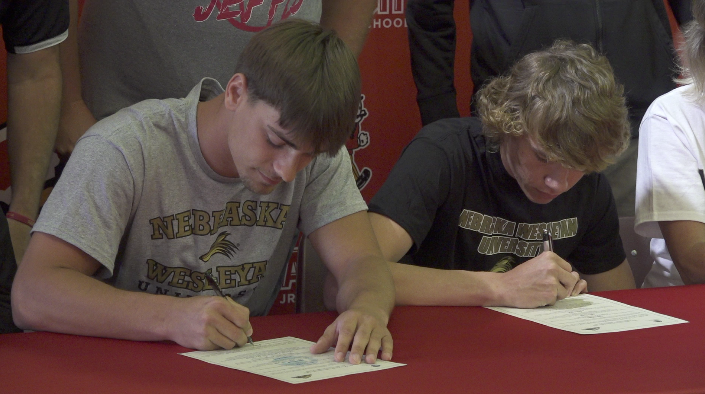 Fairbury seniors James Olds (left) and Jax Biehl (right) signed their National Letters of Intent Friday. Both will attend Nebraska Wesleyan University.