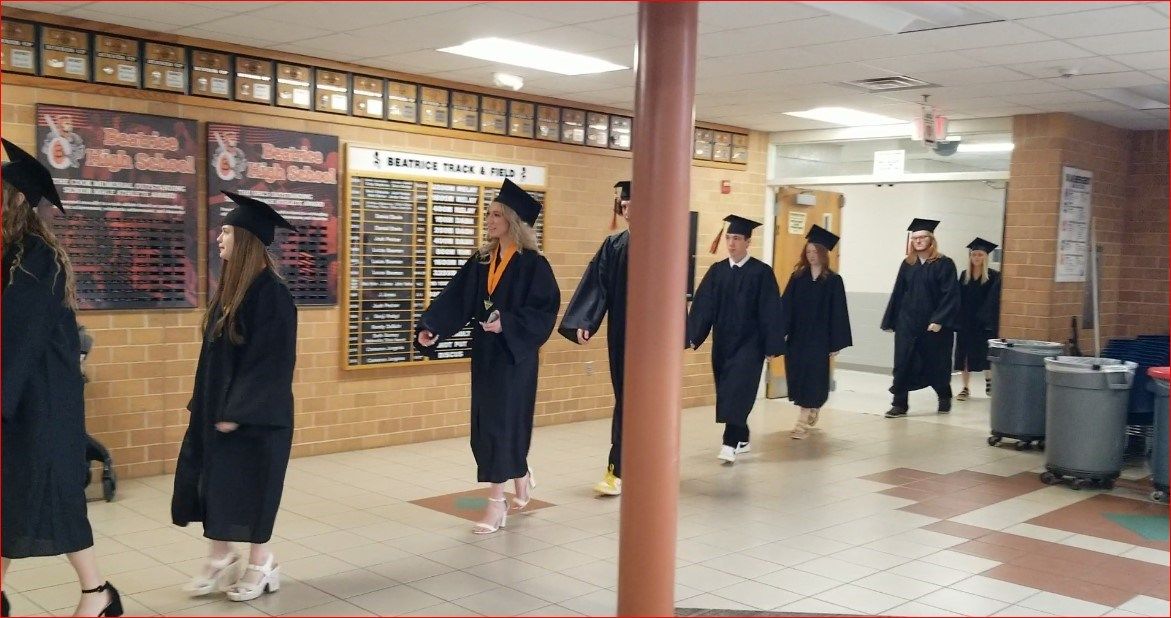 Seniors entering graduation ceremony
