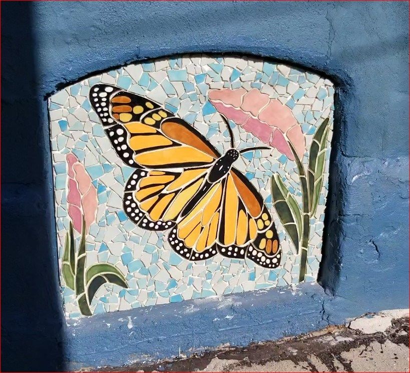 Tile art west of 5th Street