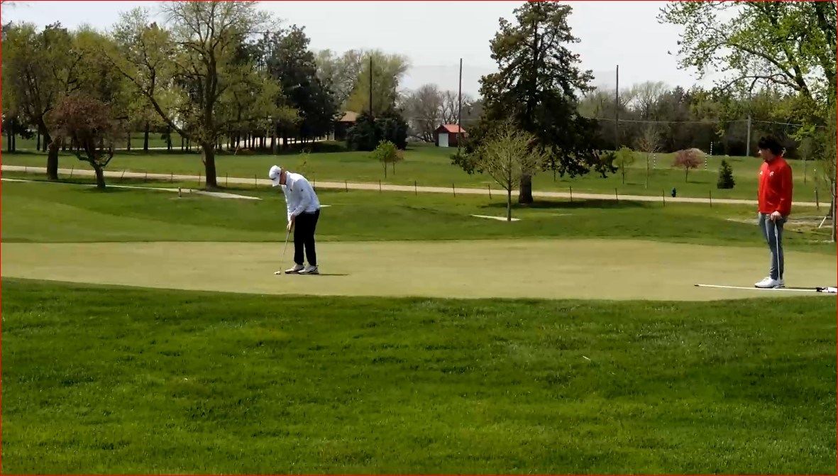 Class A and B competition at Beatrice Country Club on windy Monday