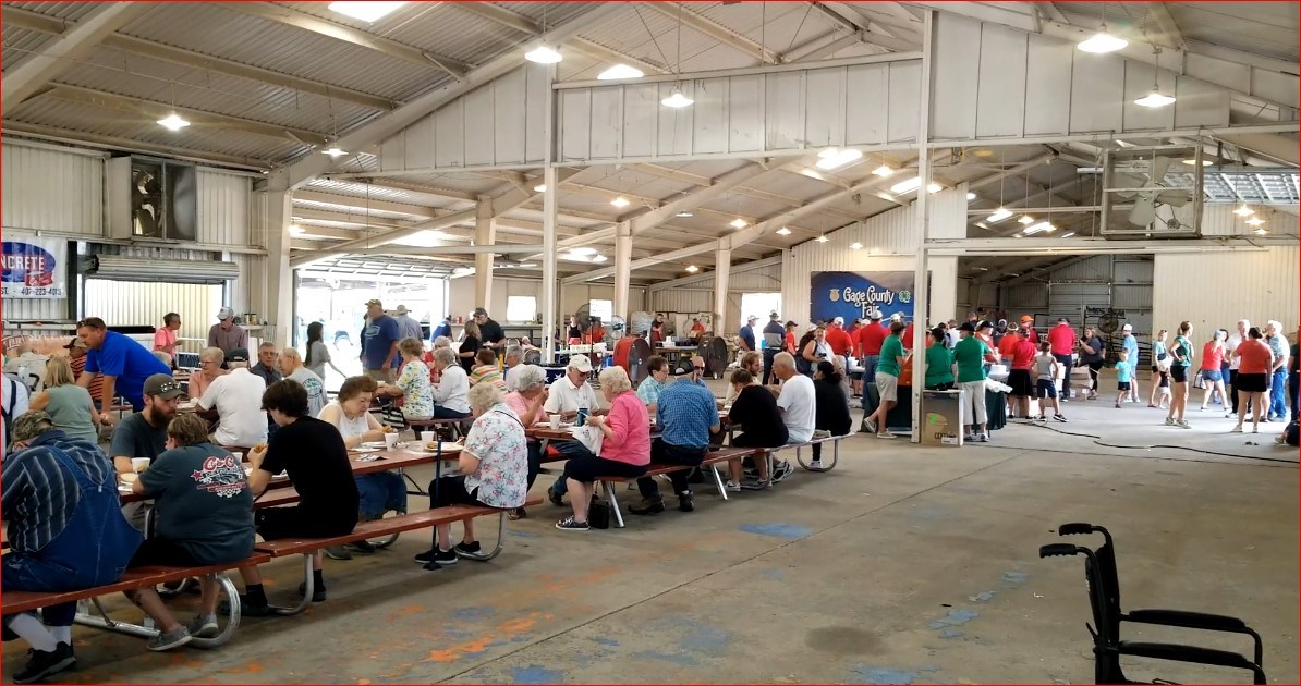 Enjoying dinner at the fairgrounds cattle barn