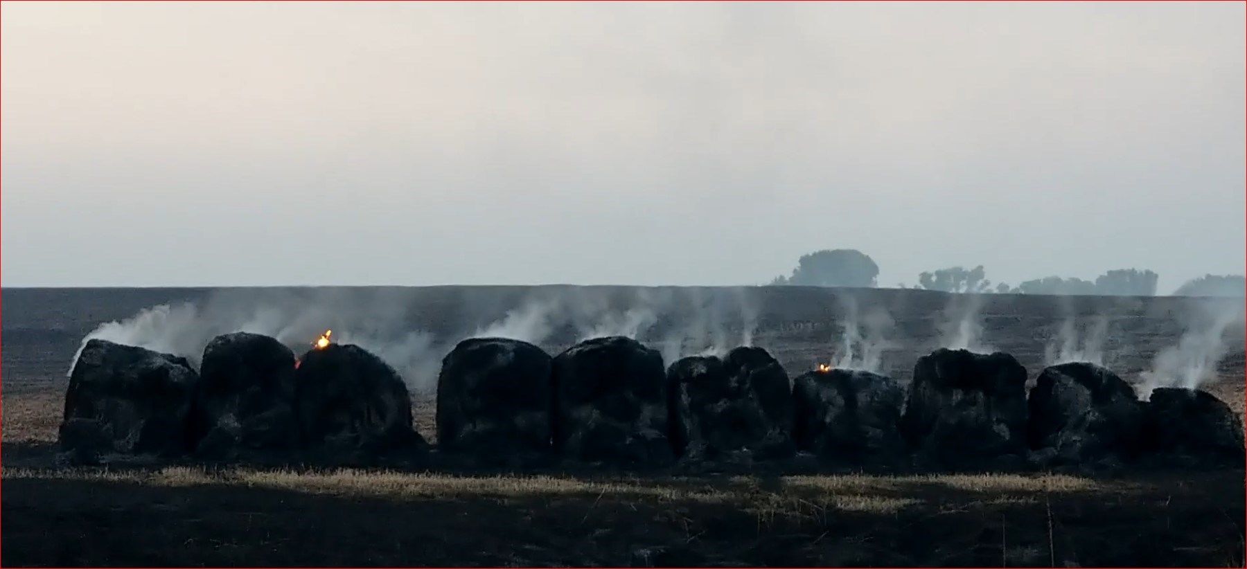 Hay bales burning off U.S. HIghway 136