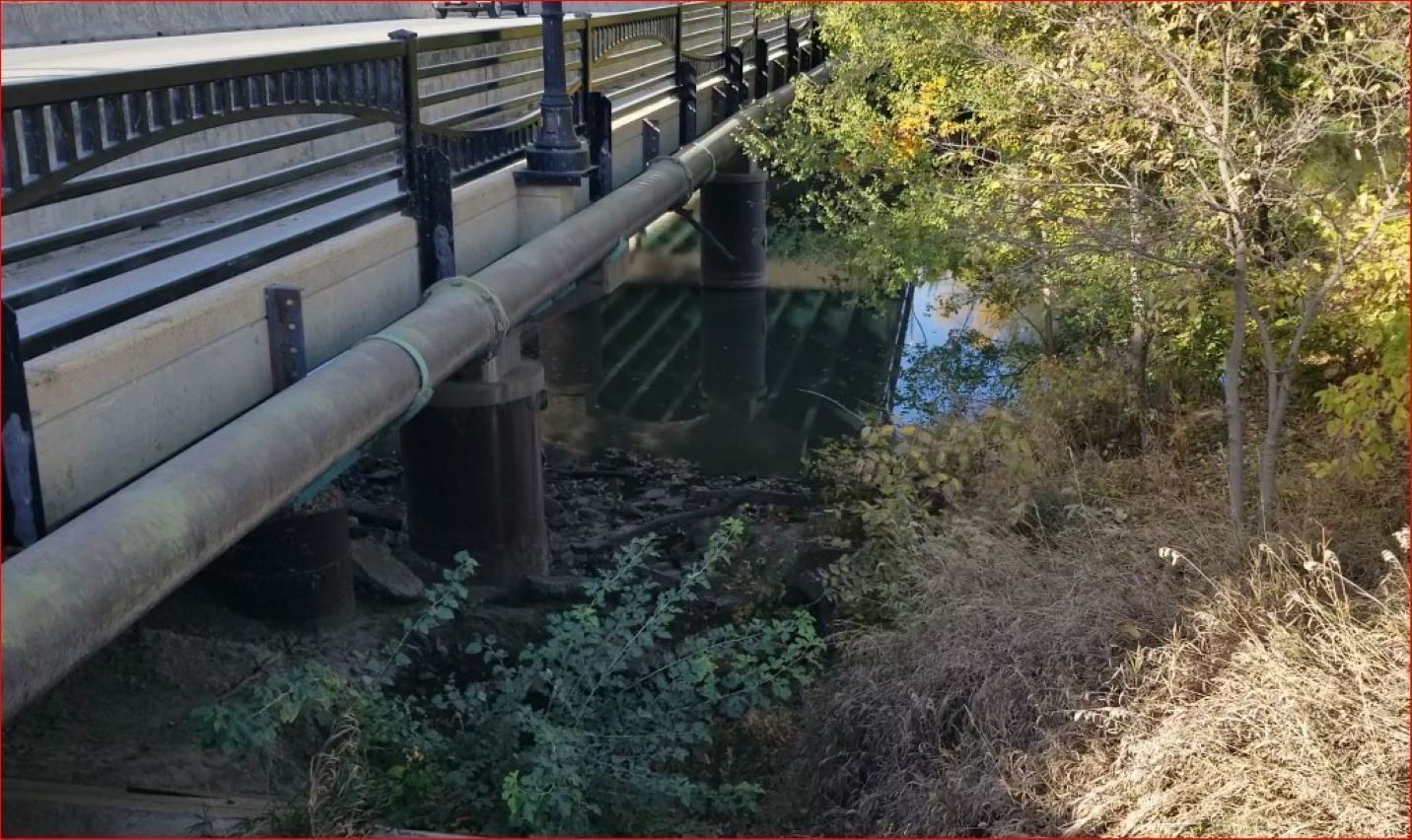 Water main attached to West Court bridge