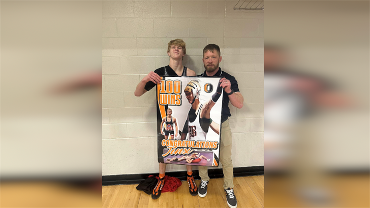 Cole Karlin w/head coach Jordan Johnson