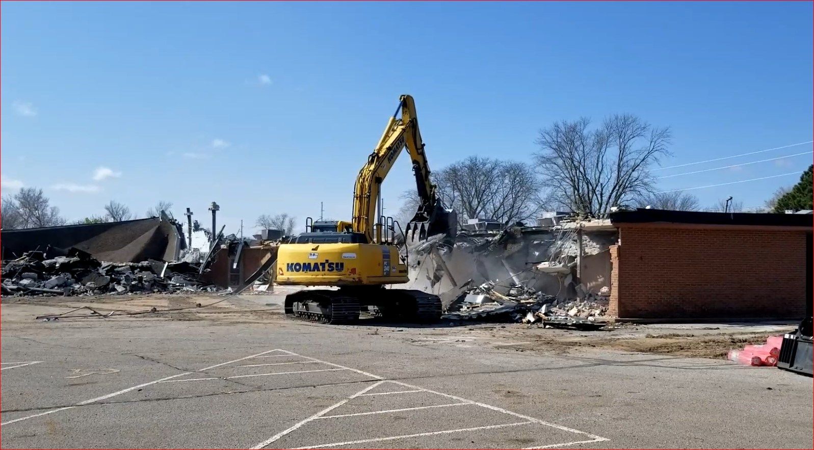 Backhoe tearing into east side of Lincoln Elementary