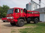 Multiple agencies douse machine shed fire near Liberty