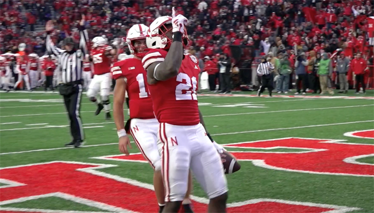 Emmett Johnson celebrates touchdown vs. Purdue in 2023