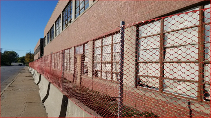 Wind blows debris, bricks from Dempster building on to Sixth Street