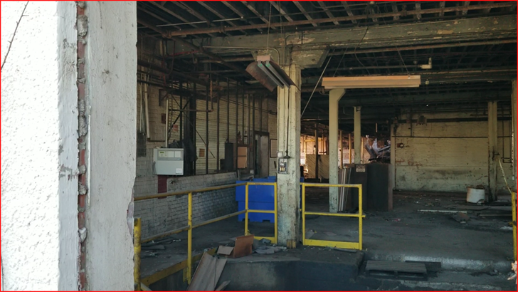 Interior of Dempster plant, seen through removed window
